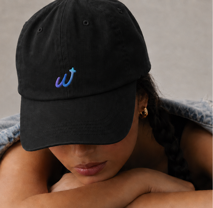 Weekend logo embroidered on a black cap